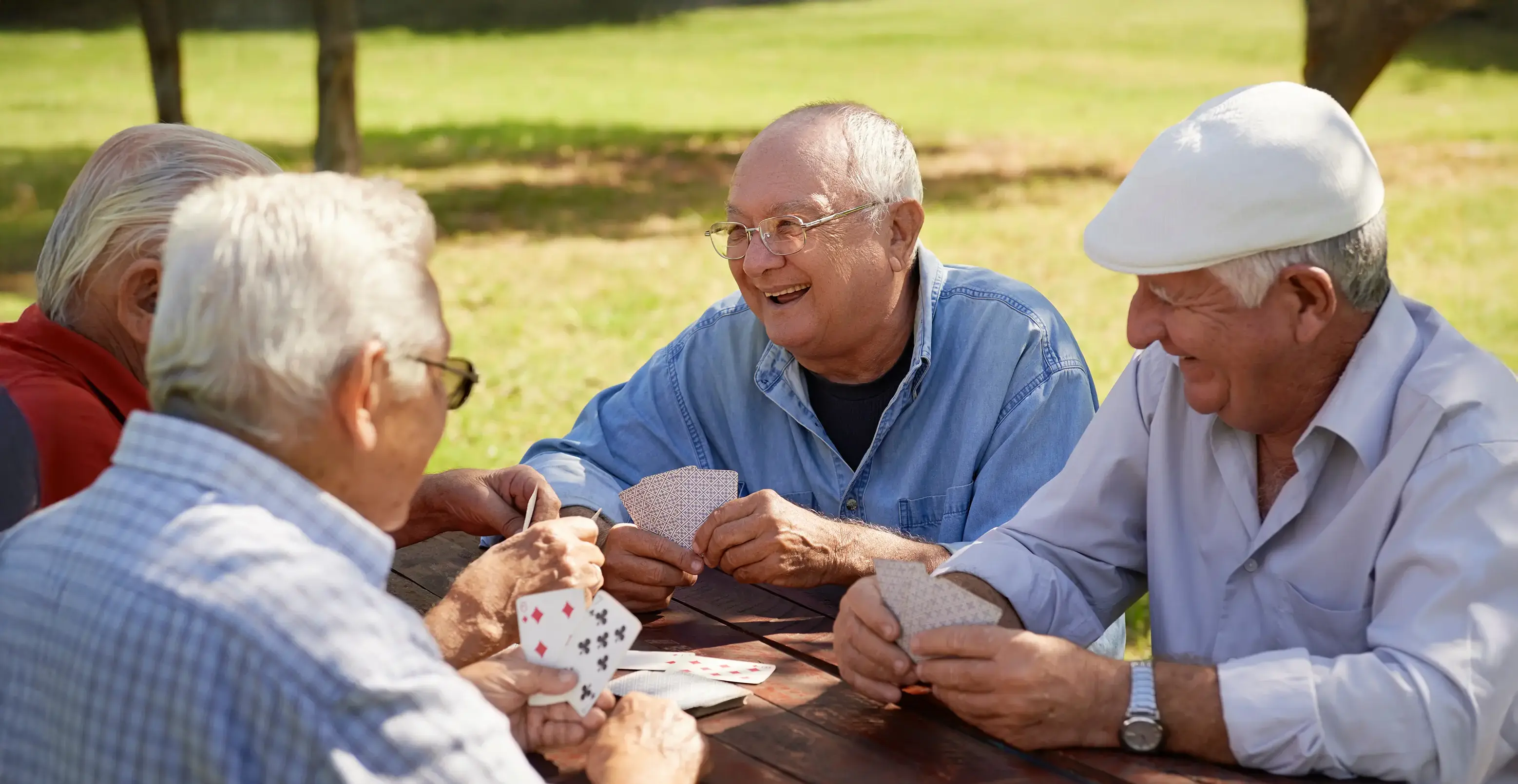 Group of friends playing cards